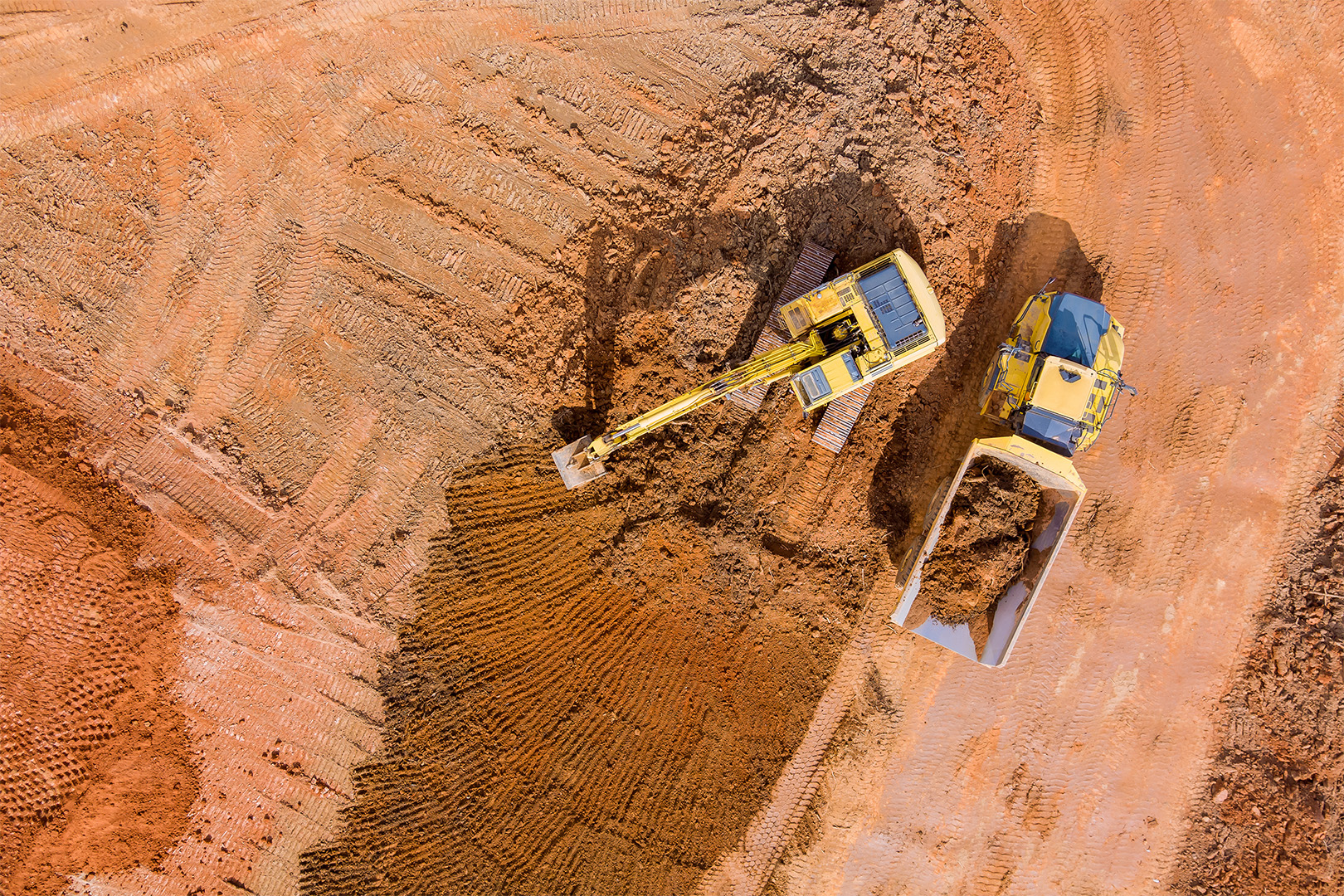 Overhead view of an excavator at work in an Ohio brownfield
